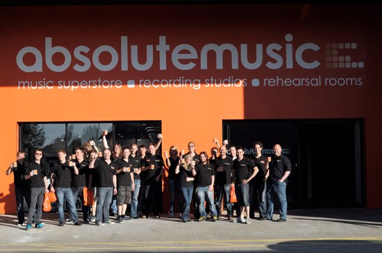 Absolute Music Team Outside the New Store